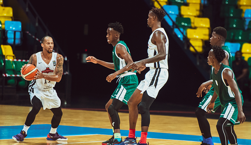 Shooting guard Kenneth Gasana (with the ball) scored a joint game-high 26 points as Patriots advanced to the semi-finals unbeaten after edging IPRC Huye 88-75 at Kigali Arena on Wednesday. / Photo: Courtesy.