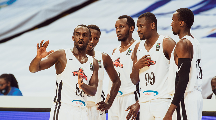Patriots captain Aristide Mugabe (L) speaks to his teammates during their semi-final win over IPRC Kigali in the 2019/20 BK Basketball National League at Kigali Arena last Friday. Patriots retained the league title for a third year running after beating Rwanda Energy Group 76-61 in the final on Saturday. 