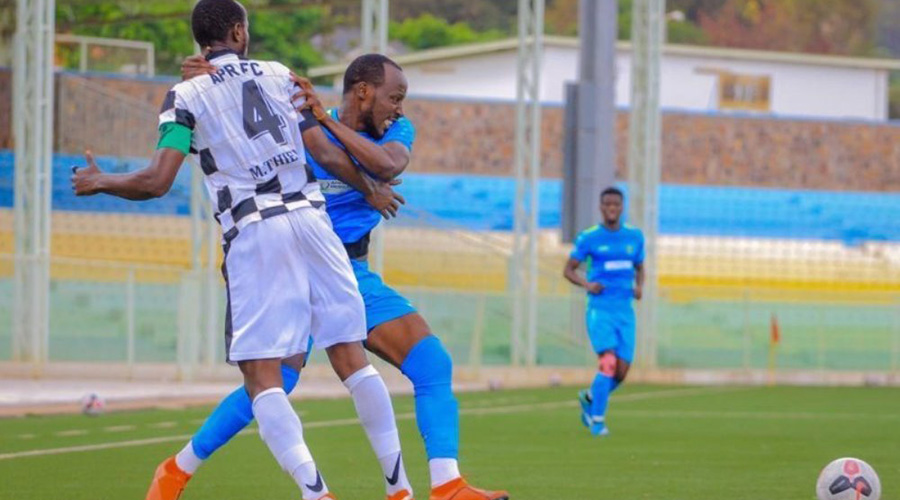 APR skipper Thierry Manzi (#4) vies for the ball with AS Kigali midfielder Eric Nsabimana during the two sidesu2019 1-1 draw at Kigali Stadium on Sunday. 