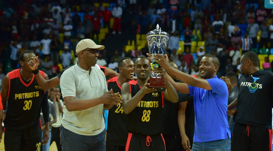 Mugabe (#88) receives the 2018-19 BK Basketball National League title after his side, Patriots, fought back to defeat Rwanda Energy Group 4-3 in the playoffs finals. 