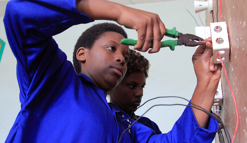 Students during electrical installation exercise at TEVT school in Huye District . / Sam Ngendahimana