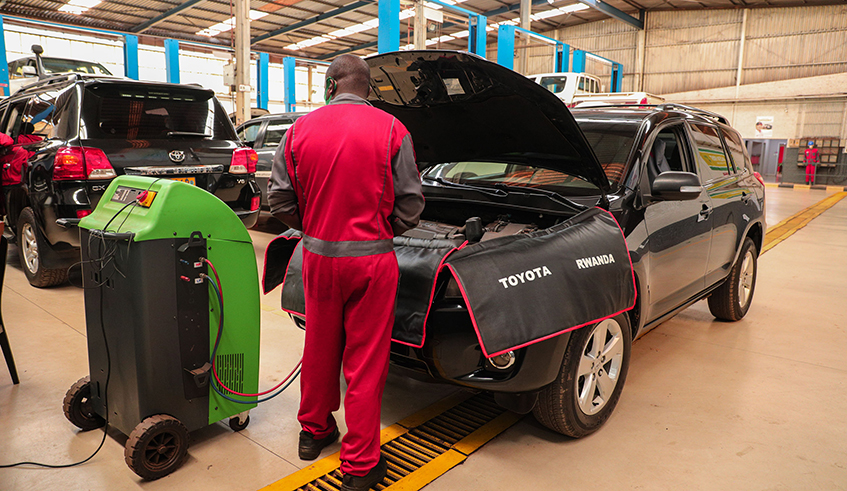 A technician diagnoses a vehicle inside Toyota Rwandaâ€™s service station. / Photos: Dan Nsengiyumva.