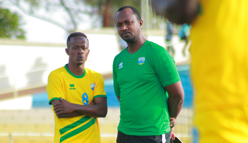 Coach Vincent Mashami (R) could start skipper Haruna Niyonzima (L) in midfield on Thursday despite joining Amavubi camp just a day before departing for Cape Verde. / Courtesy