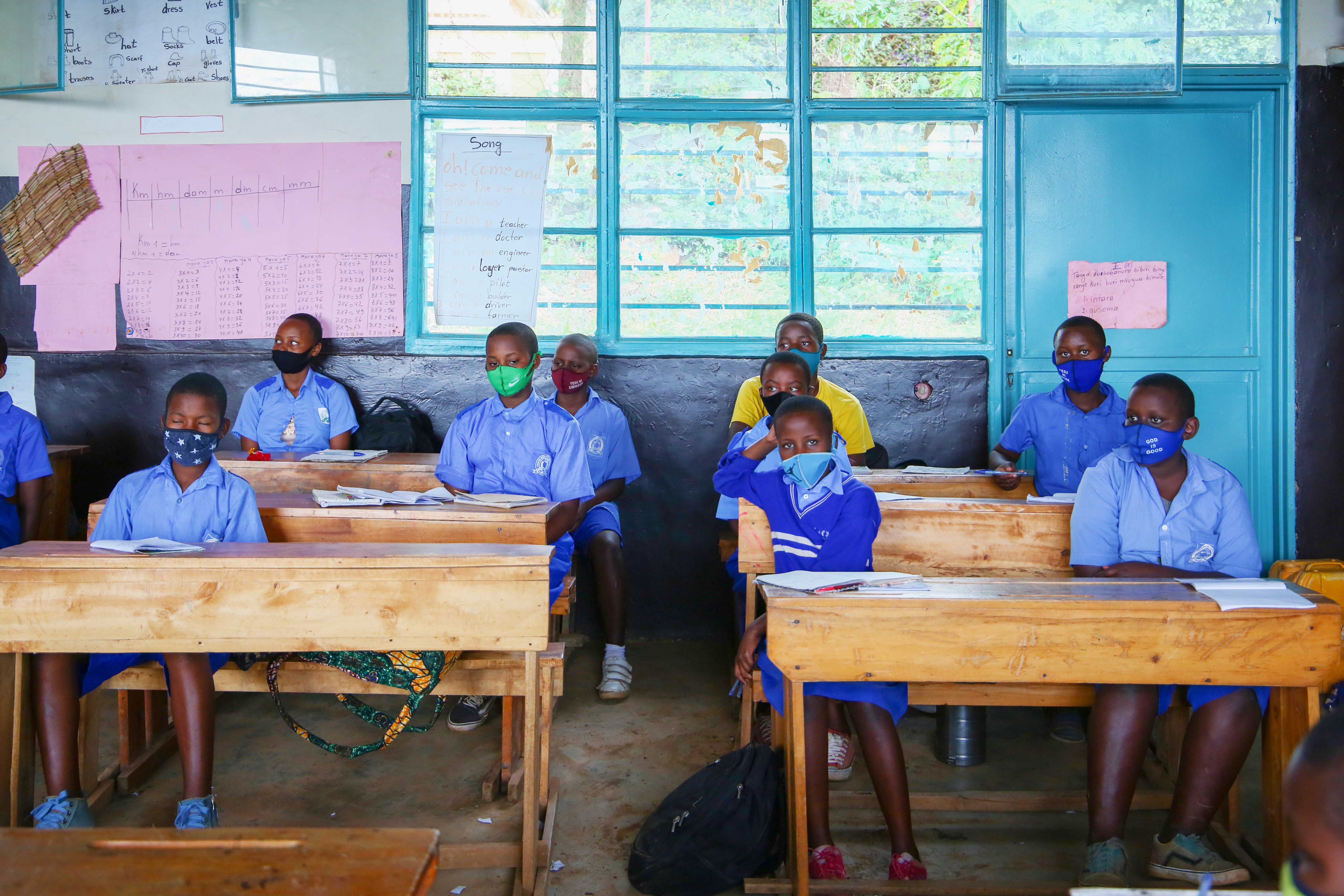 P6 students  wearing face masks during class at  Groupe Scolaire Kimironko . Photos by Dan Nsengiyumva