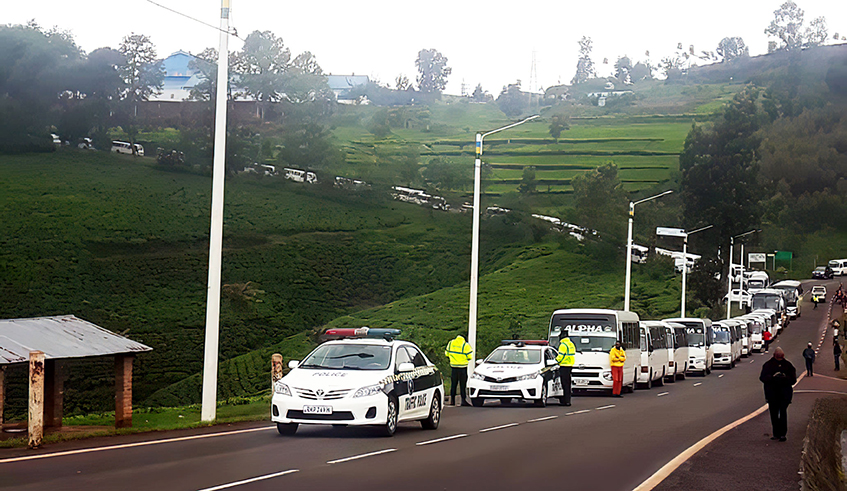 A convoy of 57 buses, escorted by police, carrying some 1886 returnees who were repatriated from DR Congo last year snake through the rolling hills and valleys of Rusizi District as they left Nyarushishi Transit Centre on Wednesday, November 18, to rejoin their communities after completing  an 11-month civic education and skilling programme. The returnees, mostly children and women, were rescued from Congolese jungles when DR Congo forces overran Rwandan militia bases during operations against negative forces in the neighbouring country. / Photo: Courtesy.