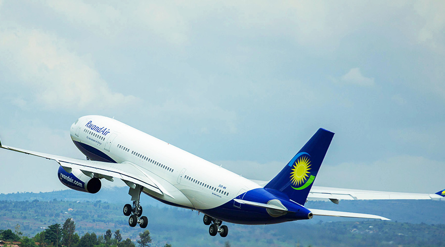 A RwandAiru2019s plane takes off at Kigali International Airport. The national carrier resumed the majority of its routes that had been halted by the Covid-19 pandemic. 
