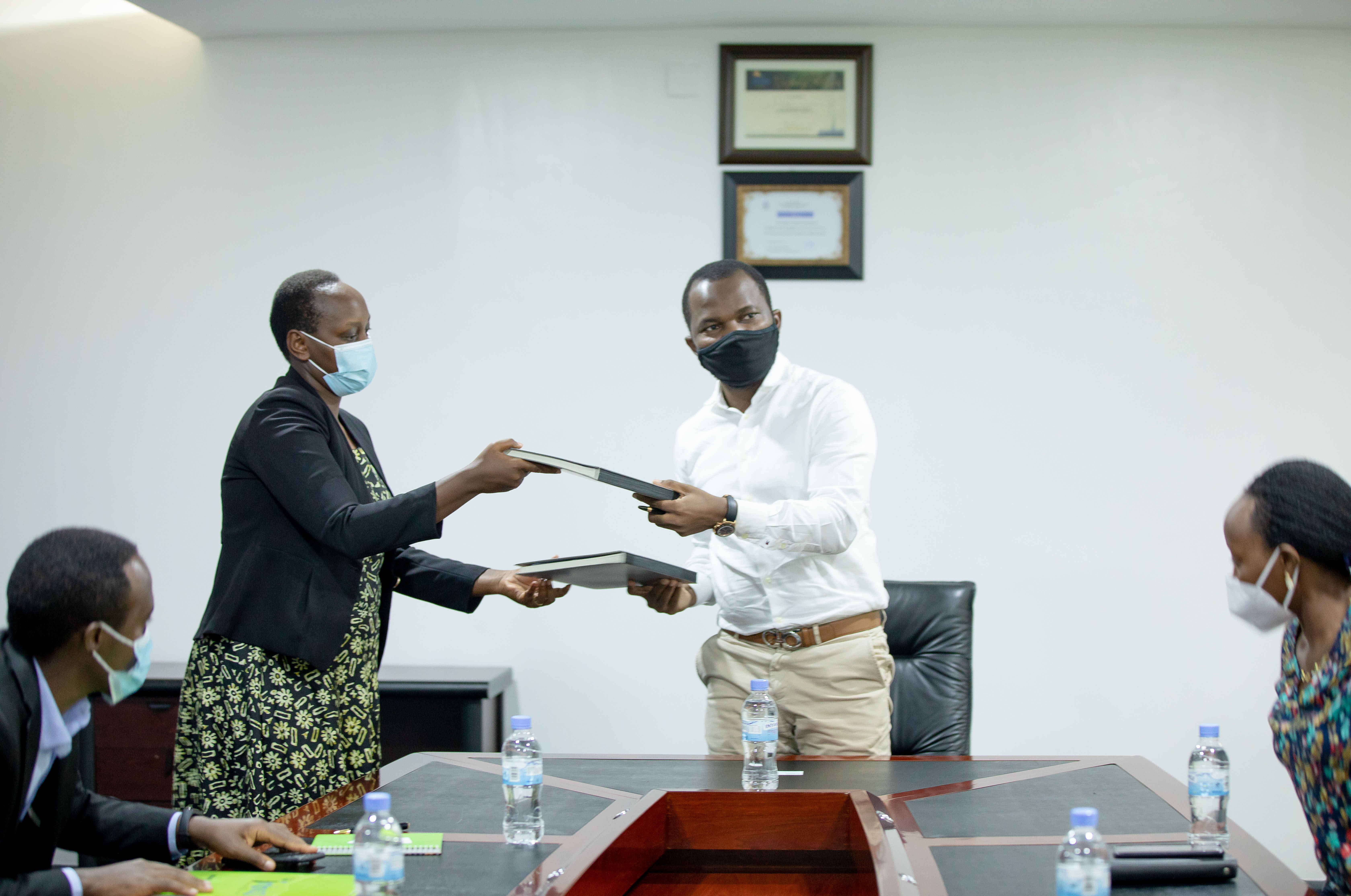Deputy Director-General of Imbuto Foundation, GÃ©rardine Umutesi, with Amida Azeez, Acting Managing Director of IHS.