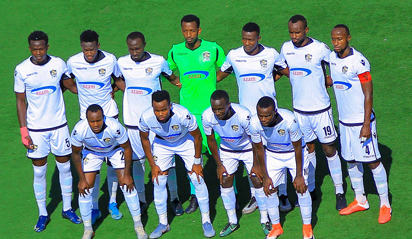 APR FC players pose for a group photo before playing a friendly match against AS Arta Solar7 of Djibouti at Kigali Stadium last week. The military side take on Goru00a0Mahia of Kenya in the Caf champions league on Saturday. / Courtesy.