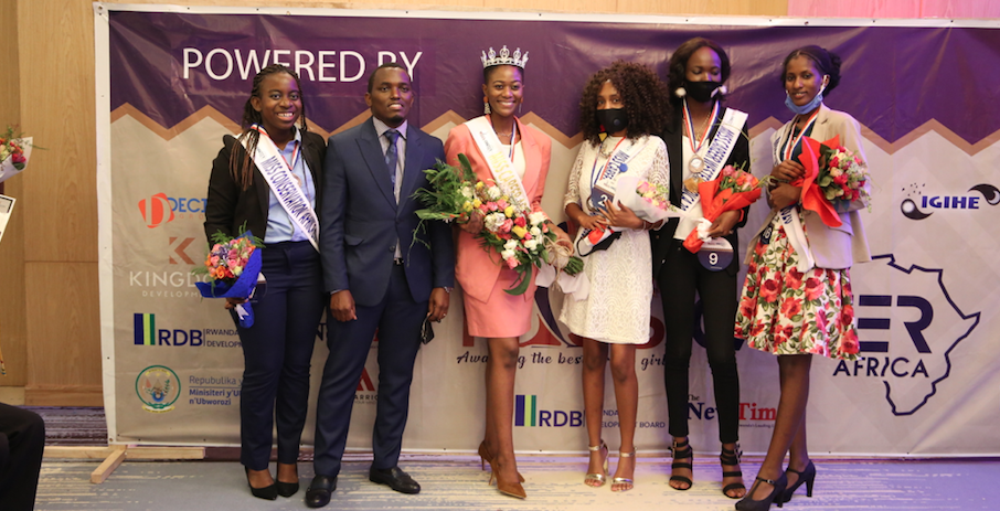 Singer and Medical Doctor Tom Close (second from left)poses for a photo with Miss Career Africa 2020 (third from left) and other finalists on November 27 at Marriott Hotel- Craish Bahizi