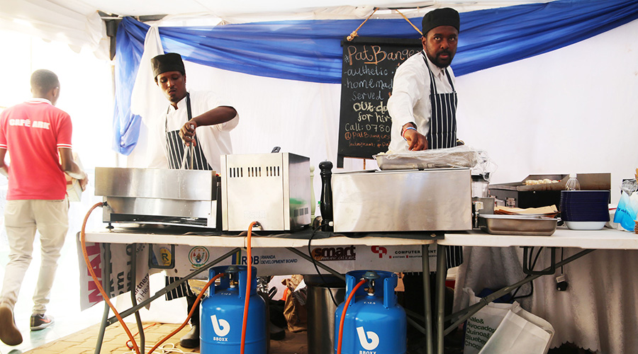 Chefs on duty at a restaurant in Remera on July 17, 2019. Rwanda is set to shift from firewood and charcoal use as the main source of cooking energy to clean energy solutions such as Liquefied Petroleum Gas (LPG), biogas and electricity. 