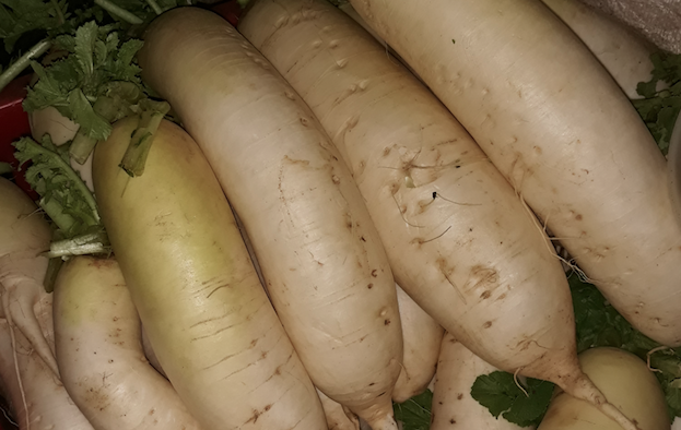 White carrots for sale in Nyabugogo Market. / Photo: Lydia Atieno