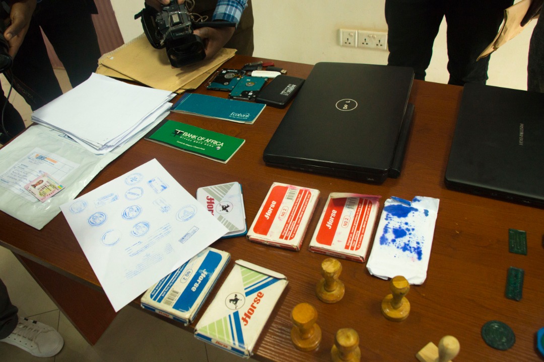 Some of the confiscated stamps and other stationary that the suspect used to forge documents. 
