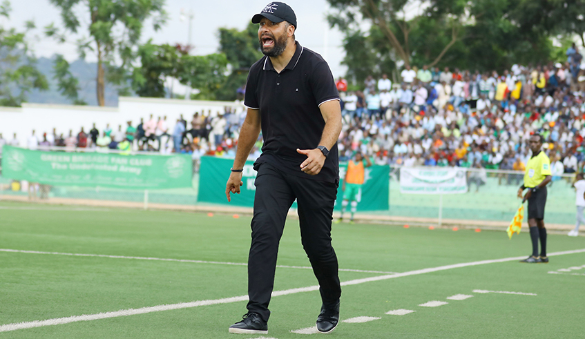 APR FC Coach Mohamed Erradi Adil gives instructions to his players during their first leg tie against Gor Mahia recently. / Photo: Sam Ngendahimana.