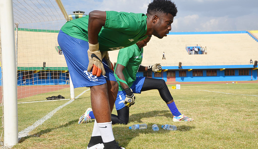 Rayon Sports goalkeeper Olivier Kwizera warms up before a recent match. The 25-year-old penned a one-year deal to join Rayon Sports in July after parting company with topflight league rivals Gasogi United. / Photo: Sam Ngendahimana.