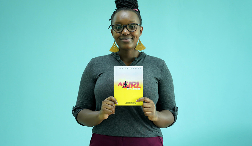 Oliver Tusiime, author of u2018A girl with a wordu2019 believes words contribute much in shaping girlsu2019 future. / Photo by Willy Mucyo.