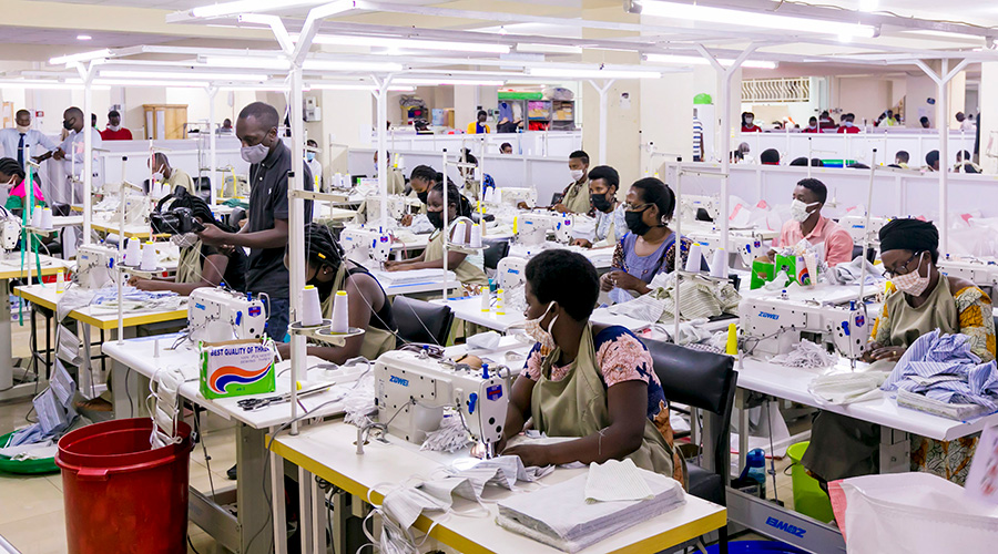 Workers produce facemasks at New Kigali Designers and Outfitters Ltd. 