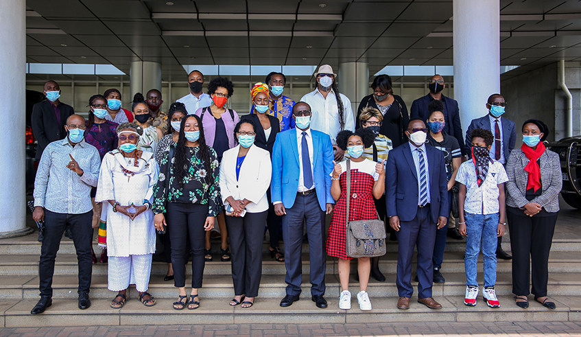 Manasseh Nshuti, the State Minister for East African Community Affairs, in a group photo with the African-American delegation. / Photo: Dan Nsengiyumva.