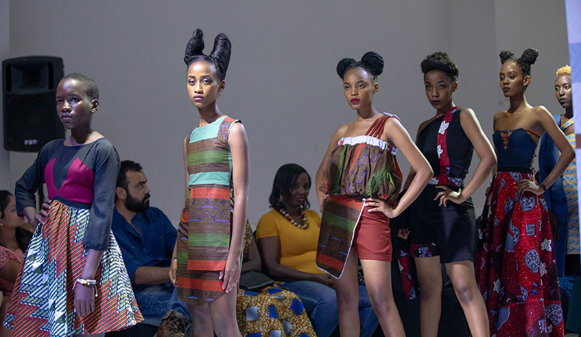 Models catwalking at a past fashion show. The webinar will discuss how to push the industry in Africa forward.