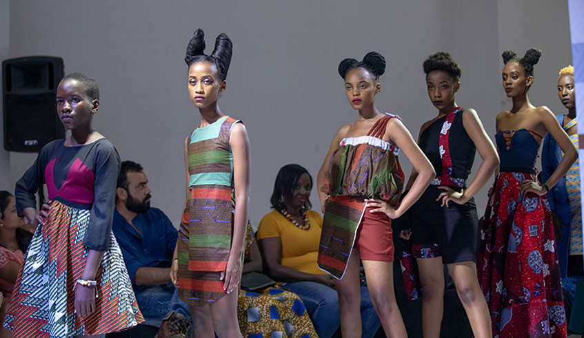 Models catwalking at a past fashion show. The webinar will discuss how to push the industry in Africa forward. Models catwalking at a past fashion show. The webinar will discuss how to push the industry in Africa forward.
