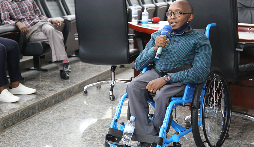 Singer Gahongayire through her charity organisation, Ndineza, donated wheelchairs to people living with disabilities . / Craish Bahizi