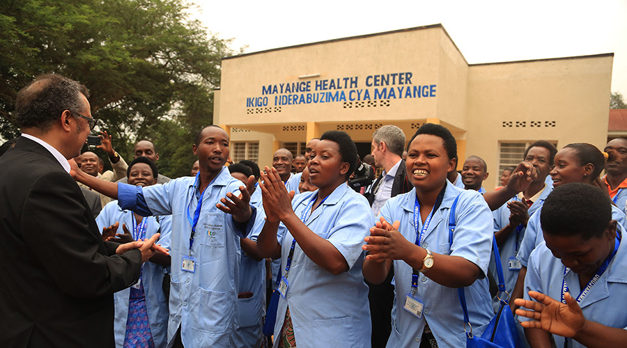 Community health workers welcome Dr Tedros Adhanom Ghebreyesus, the Director General of World Health Organization, at Mayange Health Centre in Bugesera District in 2018. 