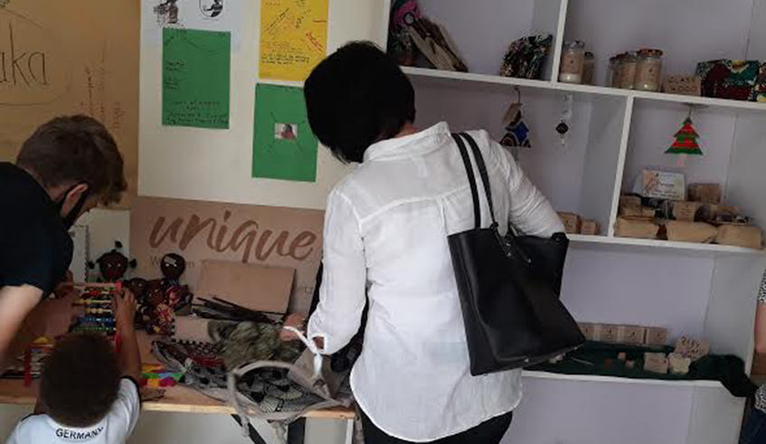 Buyers inquring about different products at the event. 