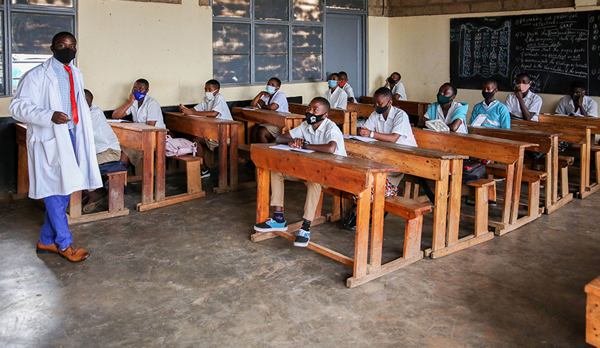 S.5 students at Groupe Scolaire Remera Protestant observe Covid-19 guidelines during a lesson on November 3 . The Government has moved to reassure the public on the Covid-19 situation in schools. / Photo: Dan Nsengiyumva.