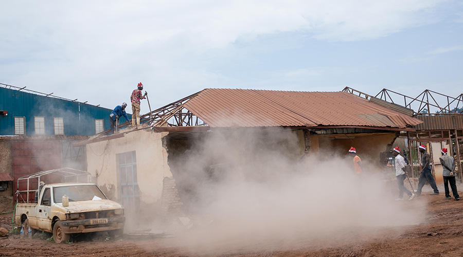 Workers demolish a warehouse in the former industrial area in Gikondo, Kicukiro District. The report shows that 557 out of 562 activities in the district have been evicted. 