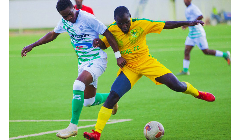 Kiyovu attacking midfielder Moustapha Nsengiyumva (L) vies for the ball with Marines FC defender Ramadhan Dusingizemungu during a league match that Kiyovu lost to the Rubavu based team. Top flight club officials are set to meet with Ferwafa officials this week to discuss resumption of the league. / Courtesy.