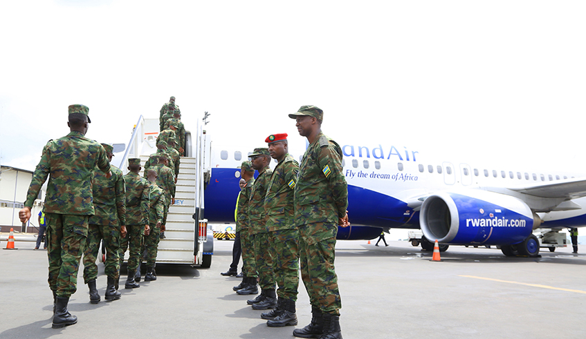 Rwanda Defence Force peacekeepers board a plane at Kigali International Airport for a peacekeeping mission in the Central African Republic in 2019. Besides the military, Rwanda also maintains a police contingent in the country since 2014. / Photo: Sam Ngendahimana.