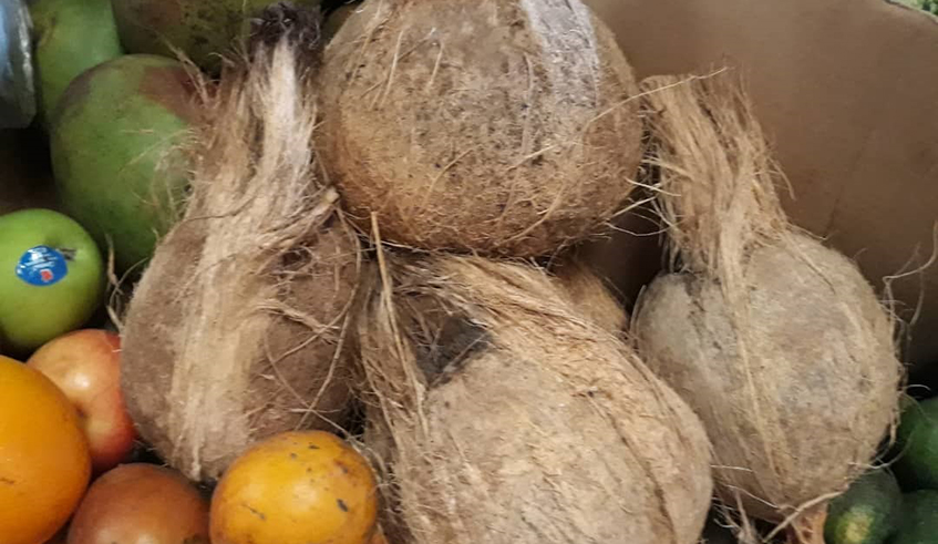 Coconuts are sold at Kimironko market for Rwf 2500 apiece. Photo: Lydia Atieno
