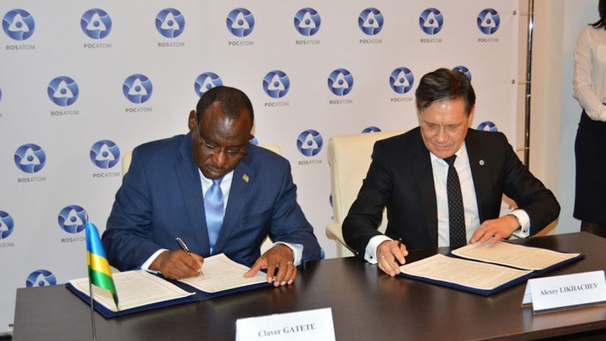 Rwandau2019s Minister for infrastructure Claver Gatete and ROSATOMu2019s Director-General, Aleksey Likhachev, sign a nuclear energy agreement in December 2018. 