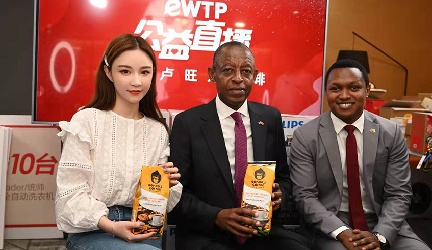 Amb. James Kimonyo, Rwandan envoy to China (centre) with Xueli Cherie, a Chinese online influencer, and Sam Abikunda, Commercial Attachu00e9 at the embassy during a live streaming promotion event  in China. / Photo: Courtesy.