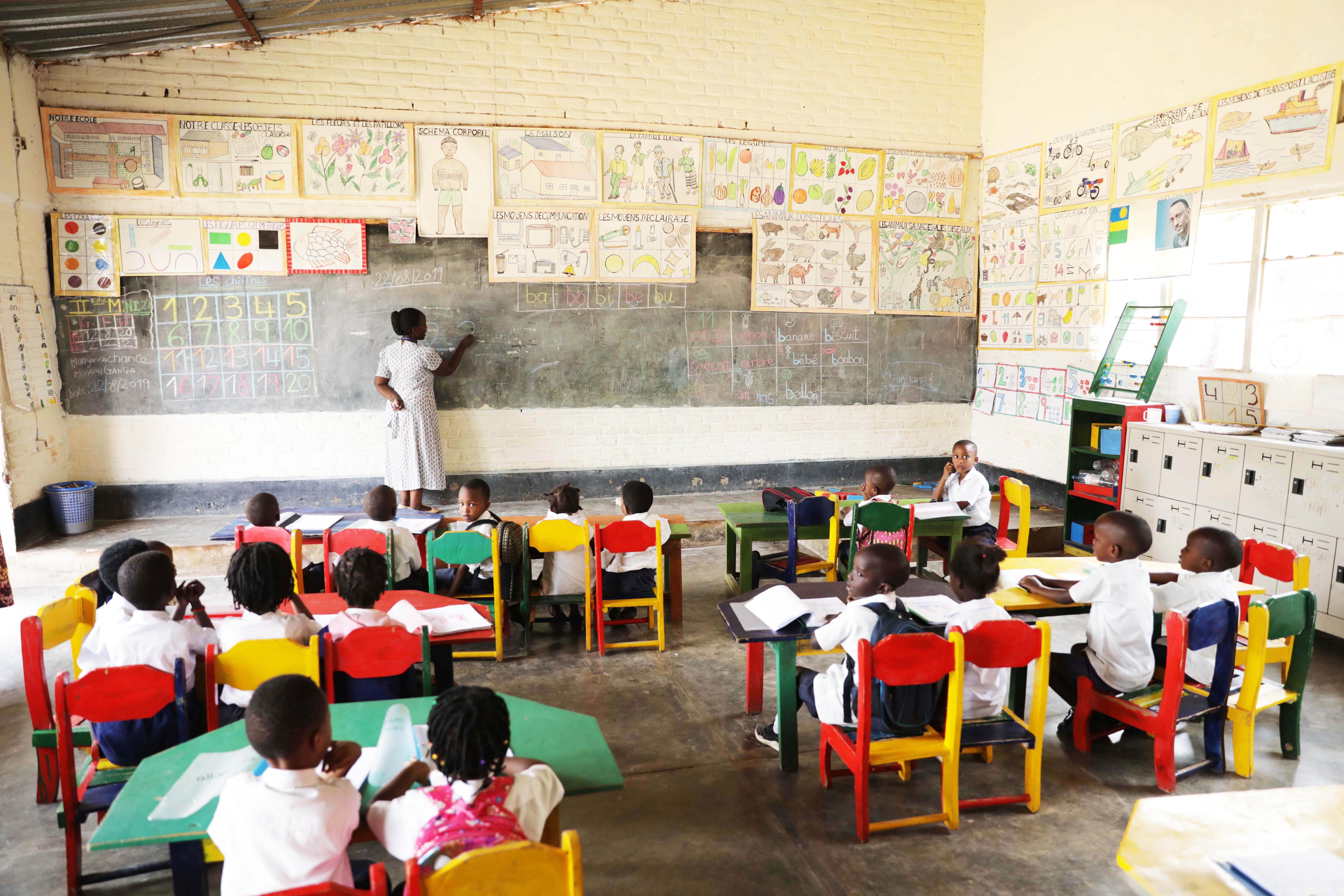 Nursery school pupils follow their teacher at Umuco Mwiza School in Kigali. 