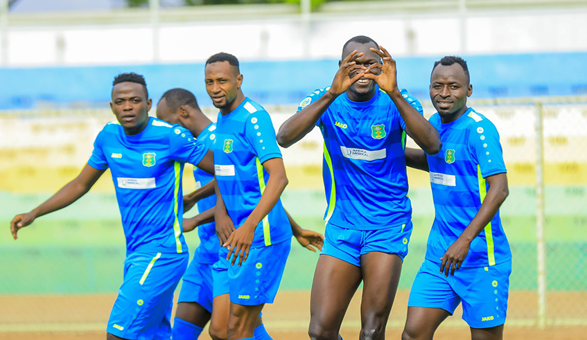 AS Kigali players celebrate a goal in a recent game. AS Kigali progressed to the next round of the Total CAF Confederations Cup after defeating KCCA FC on the away goals rule . / Courtesy