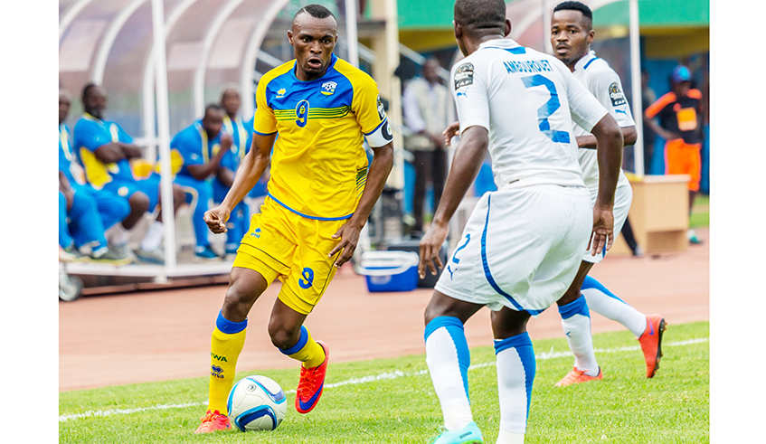 Amavubi striker Jacques Tuyisenge (L) during a previous match. The 29 year-old has called on his teammates to put up a show of a lifetime if they are to make an impact in the CHAN 2020 tournament. / File.