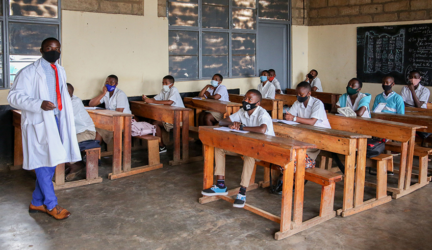 Students follow their teacher at Groupe Scolaire Remera Protestant in November last year.A total 10,864 teachers for both primary and secondary schools who were this week hired without degrees. / Dan Nsengiyumva