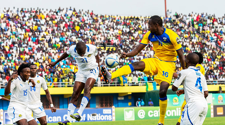 Amavubi striker Ernest Sugira (C) tries to control a ball in a past match. The Rayon Sports forward has appealed to fans to back the national team during the CHAN 2020 campaign. 
