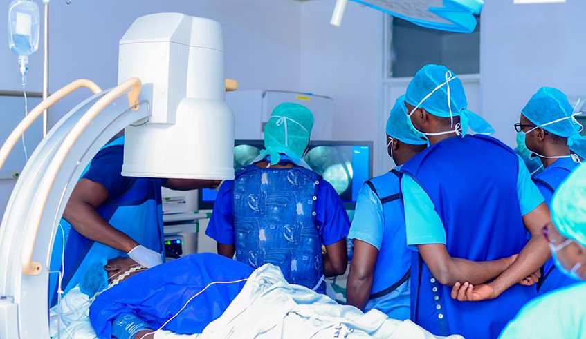 Medical personnel during an endoscopic surgery at King Faisal Hospital, Kigali. The hospital has scaled up efforts to offer healthcare to patients through minimally invasive surgery as it continues to expand and add value to services offered. The facility eyes to become a regional hub for minimally invasive therapies. / Photo: Courtesy. 