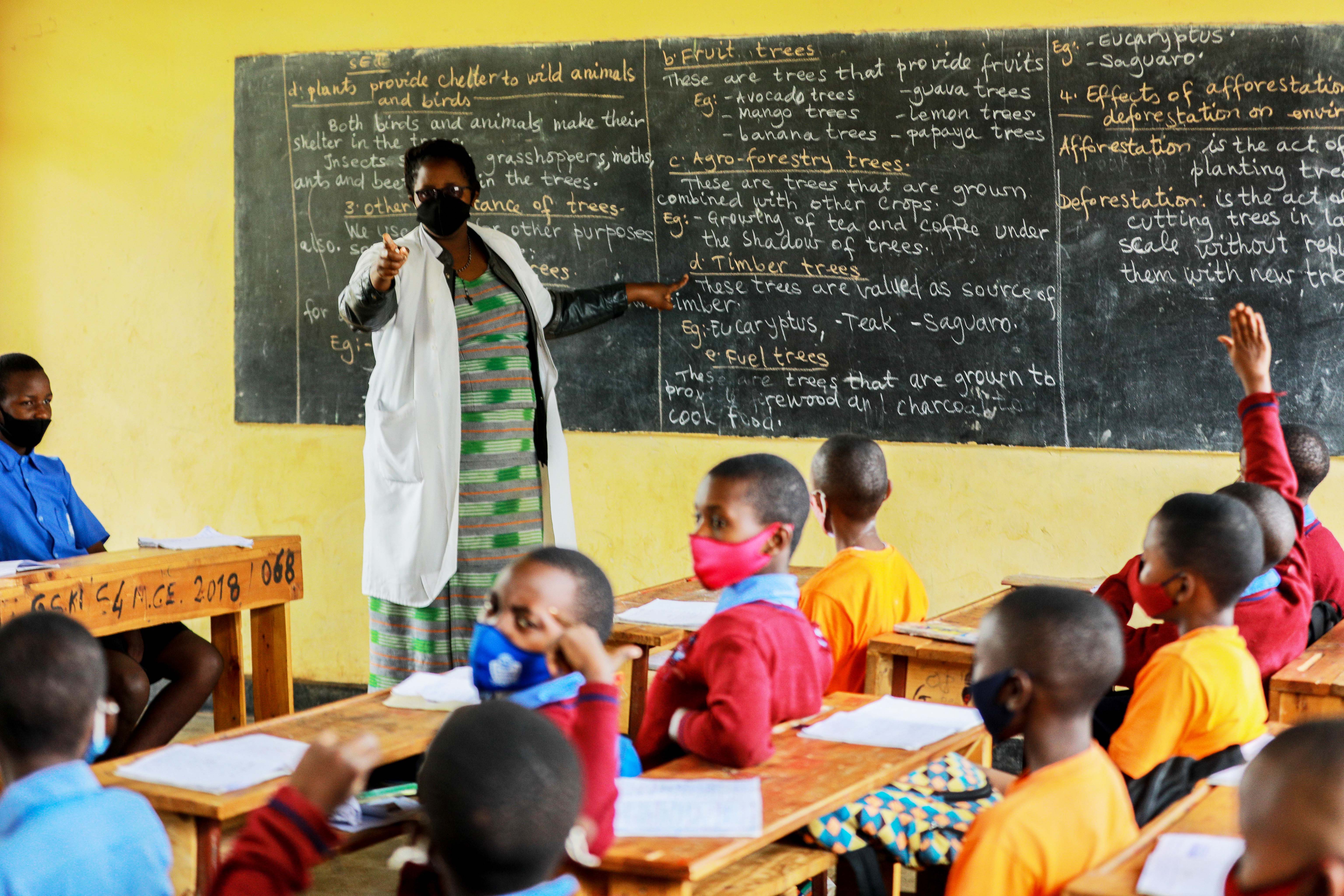 A teacher conducts a class at Groupe Scolaire Kimironko II last month. 