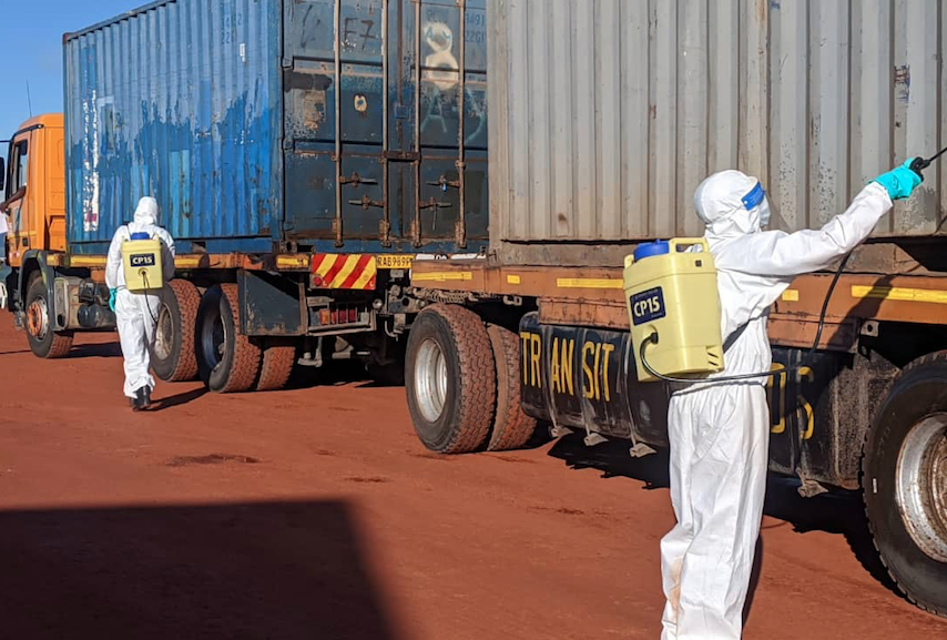 Customs disinfecting and clearing processes for cargo trucks from Tanzania at Rusumo border in a bid to curb COVID 19. /  file.