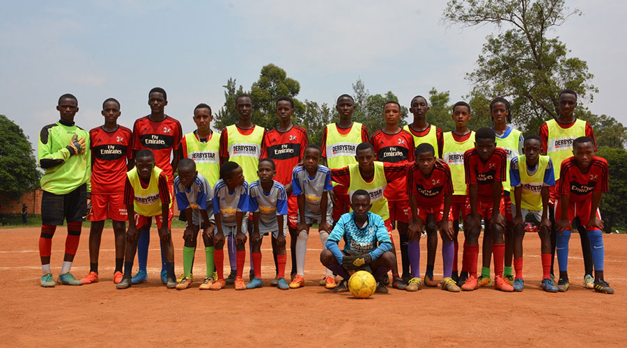 Simon-Pierre Muhire (third left, second row) with his teammates before a past match. 