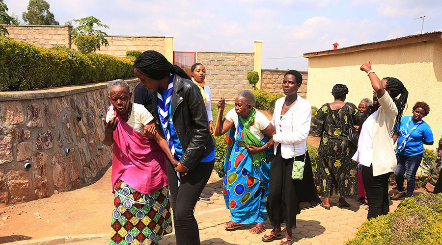 Members of the Association of Student Survivors of the Genocide (AERG) during a visit at a model village built for elderly Genocide survivors in Nyanza District in 2019. 