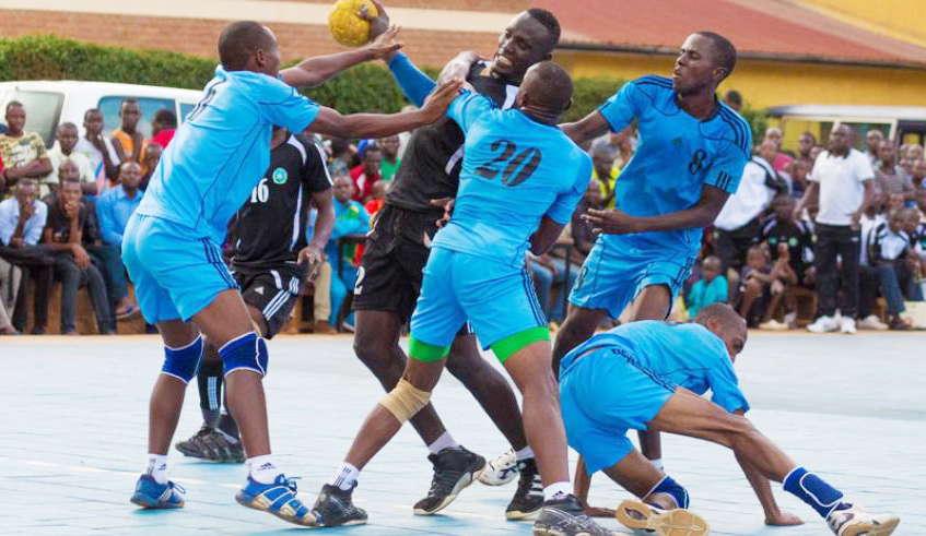 Police Handball players vie for the ball with APRF during a past league match at Kimisagara playground. The Handball league is expected to start next month. / Photo: Sam Ngendahimana.
