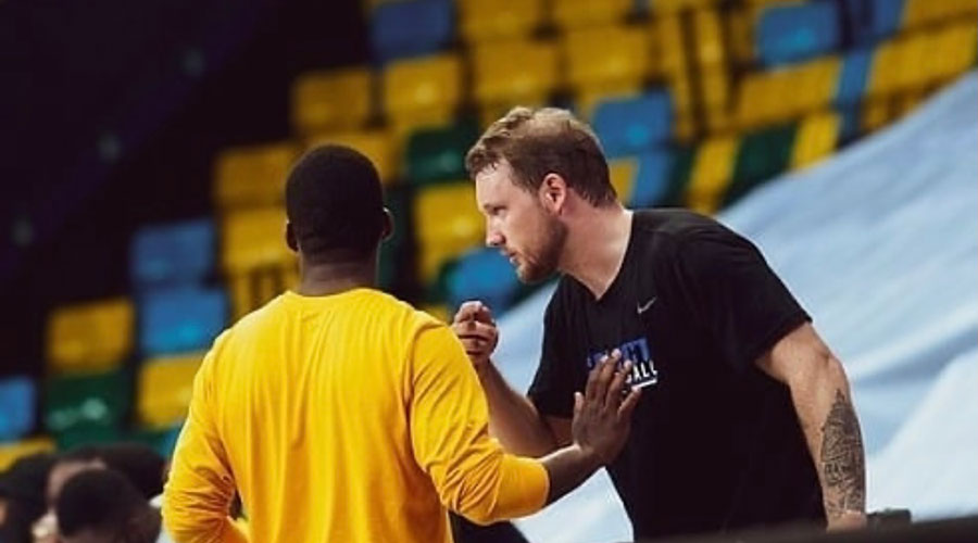 Zachary J. Cave served as assistant coach of IPRC-Musanze during the 2020 playoffs games. 