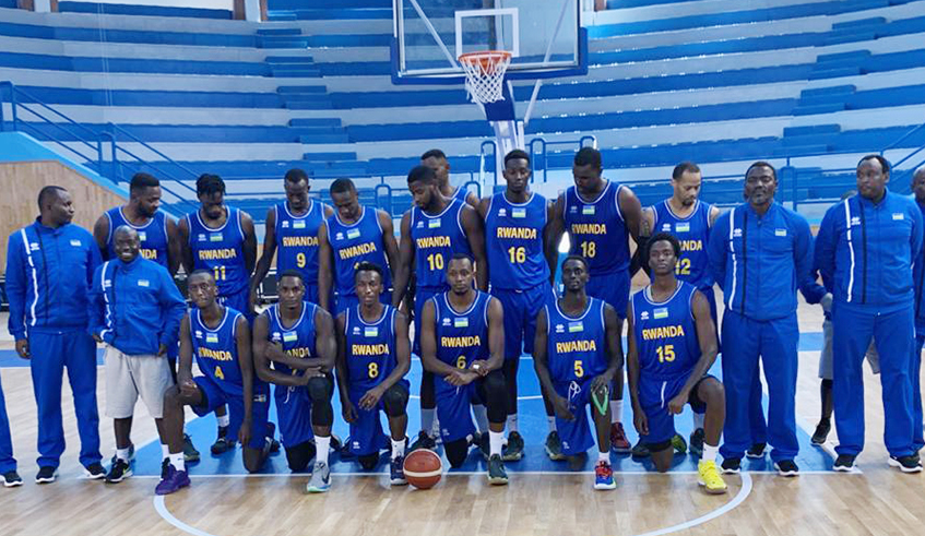 The national basketball team pose for a group photo before a friendly match against Morocco  in Tunisia  recently. Experts and Basketball fans have called for thorough preparations if Rwanda is to perform well in the Afro-basketball tourney in August. / Damas Nkotanyi.