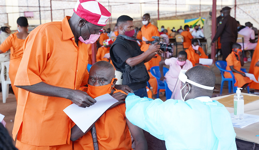 An inmate receives the Covid-19 jab during a vaccination exercise at Nyarugenge Prison in Kigali on Tuesday, March 9. / Photo: Willy Mucyo.