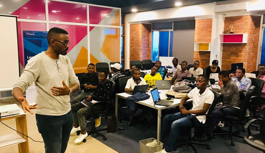 Local coders during a skills development workshop by a trainer from startup Andela Rwanda. As start-up hubs mature, they bring the best and the brightest business minds, developers, designers, investors. / Photo: Courtesy.