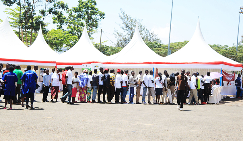 People queue for HIV test at Amahoro Stadium in December 2018. / Photo: Sam Ngendahimana.