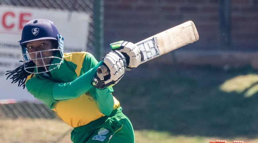 Rwanda currently ranks 7th in Africa and 34th globally in womenu2019s cricket, but targets to be inside top four and top 20, respectively, by 2024. Pictured here is Rwanda international Henriette Ishimwe during a past match against Mozambique in Zimbabwe. 